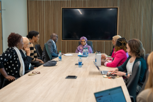 Image of Mme. Johnson Sirleaf speaking in the Office of International Affairs Executive Boardroom with members of ACFAM and OIA