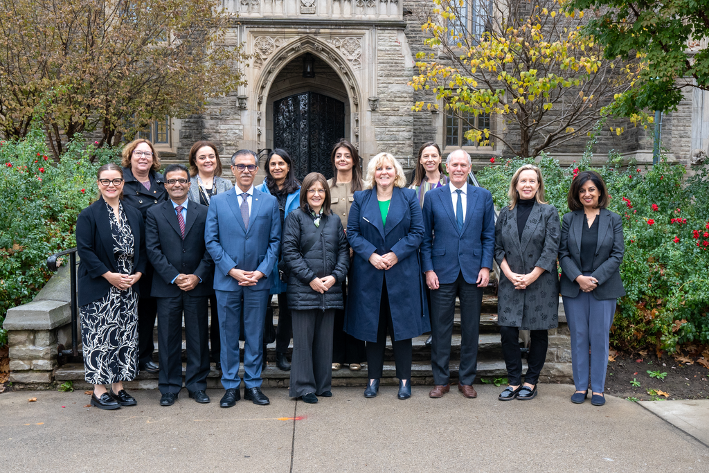 AKU and McMaster senior leaders in front of University Hall